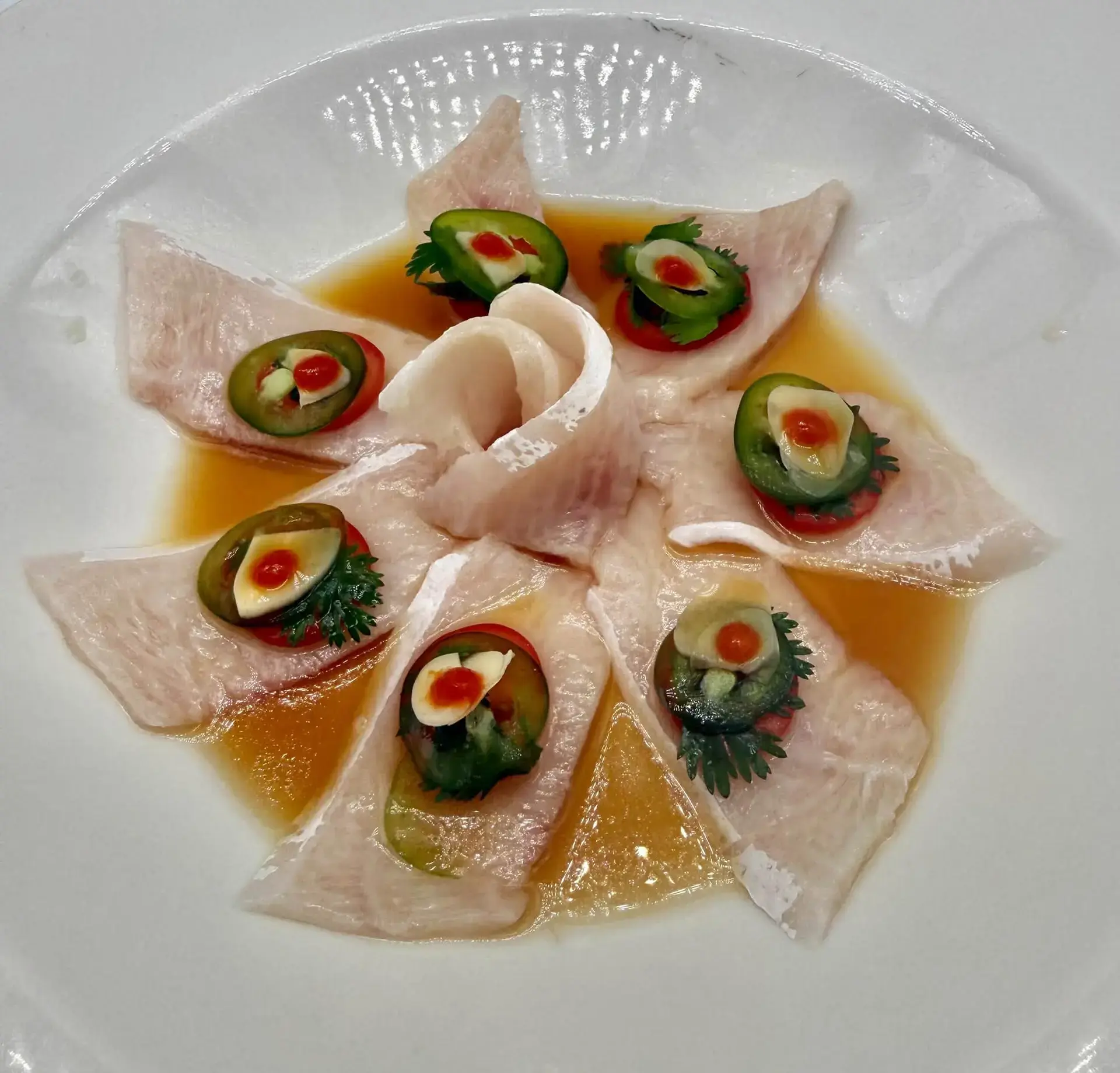 Yellowtail carpaccio at White Wasabi Sushi, Courtesy Kae Arisara